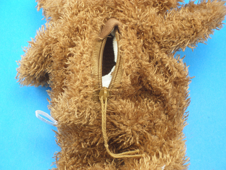 Rear of the unstuffed bear.  Insert the stuffing through the zipper opening.